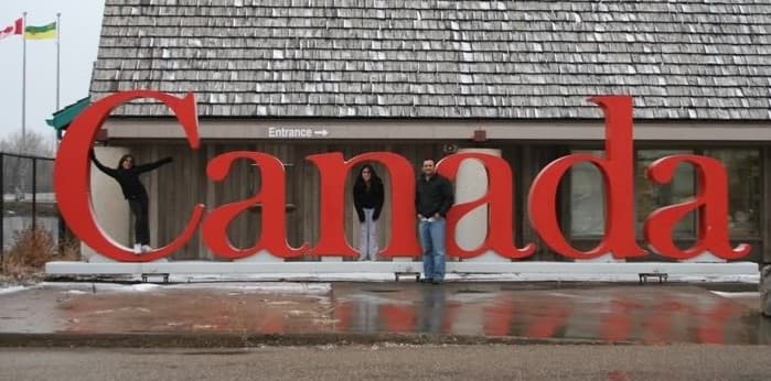 My family happily arriving in Canada! Canada is consistently voted one of the best countries to live in.